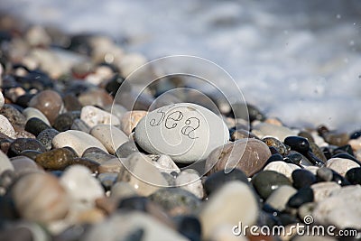 Words on pebble stones â€“ motivational concept slogan â€“ word sea Stock Photo